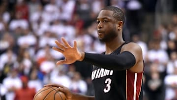 May 3, 2016; Toronto, Ontario, CAN; Miami Heat guard Dwyane Wade (3) gestures as he dribbles the ball up court against Toronto Raptors in game one of the second round of the NBA Playoffs at Air Canada Centre. Mandatory Credit: Dan Hamilton-USA TODAY Sports