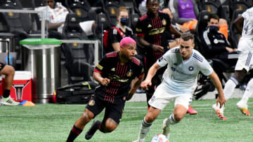 ATLANTA, GA - APRIL 24: Atlanta United forward #7 Josef Martinez dribbles the ball against Chicago defender #2 Boris Sekulic during a game between Chicago Fire FC and Atlanta United FC at Mercedes-Benz Stadium on April 24, 2021 in Atlanta, Georgia. (Photo by Perry McIntyre/ISI Photos/Getty Images)