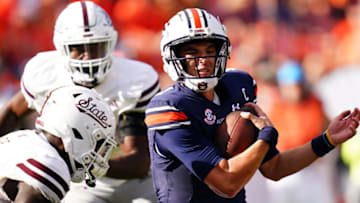 Auburn footballOct 28, 2023; Auburn, Alabama, USA; Auburn Tigers quarterback Payton Thorne (1) scrambles for yardage against the Mississippi State Bulldogs during the second quarter at Jordan-Hare Stadium. Mandatory Credit: John David Mercer-USA TODAY Sports