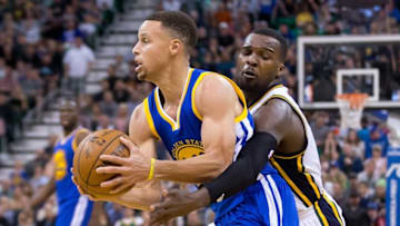 Mar 30, 2016; Salt Lake City, UT, USA; Utah Jazz guard Shelvin Mack (8) defends against Golden State Warriors guard Stephen Curry (30) during overtime at Vivint Smart Home Arena. Golden State won 103-96. Mandatory Credit: Russ Isabella-USA TODAY Sports