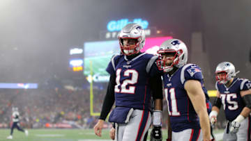FOXBOROUGH, MASSACHUSETTS - JANUARY 04: Tom Brady #12 of the New England Patriots and Julian Edelman #11. (Photo by Maddie Meyer/Getty Images)