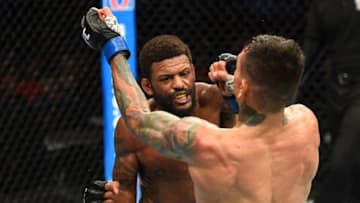 LINCOLN, NE - AUGUST 25: (L-R) Michael Johnson punches Andre Fili in their lightweight fight during the UFC Fight Night event at Pinnacle Bank Arena on August 25, 2018 in Lincoln, Nebraska. (Photo by Josh Hedges/Zuffa LLC/Zuffa LLC via Getty Images)