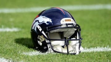 Dec 13, 2015; Denver, CO, USA; General view of a Denver Broncos helmet before the game against the Oakland Raiders at Sports Authority Field at Mile High. Mandatory Credit: Ron Chenoy-USA TODAY Sports
