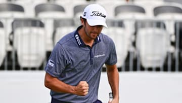 PALM HARBOR, FLORIDA - MARCH 19: Davis Riley of the United States reacts to his birdie on the 17th green during the third round of the Valspar Championship on the Copperhead Course at Innisbrook Resort and Golf Club on March 19, 2022 in Palm Harbor, Florida. (Photo by Julio Aguilar/Getty Images)