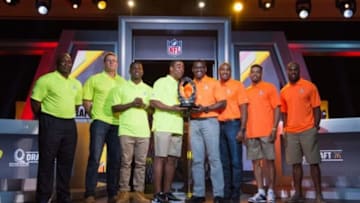 January 20, 2015; Phoenix, AZ, USA; (L-R) Team Carter alumni co-captain John Randle, defensive end J.J. Watt (99) of the Houston Texans, wide receiver Antonio Brown (84) of the Pittsburgh Steelers, and alumni captain Cris Carter pose for a photo with Team Irvin alumni captain Michael Irvin, alumni co-captain Darren Woodson, cornerback Joe Haden (23) of the Cleveland Browns, and running back DeMarco Murray (29) of the Dallas Cowboys during the Pro Bowl Kickoff Press Conference at The Arizona Biltmore. Mandatory Credit: Kyle Terada-USA TODAY Sports