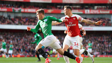 LONDON, ENGLAND - MAY 05: Solomon March of Brighton and Hove Albion (L) is brought down by Granit Xhaka of Arsenal inside the box which lead to a penalty being awarded during the Premier League match between Arsenal FC and Brighton & Hove Albion at Emirates Stadium on May 05, 2019 in London, United Kingdom. (Photo by Catherine Ivill/Getty Images)
