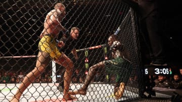 NEW YORK, NEW YORK - NOVEMBER 12: Alex Pereira knocks down Israel Adesanya during the 5th round on his way toward winning their Middleweight fight at UFC 281 at Madison Square Garden on November 12, 2022 in New York City. (Photo by Jamie Squire/Getty Images)