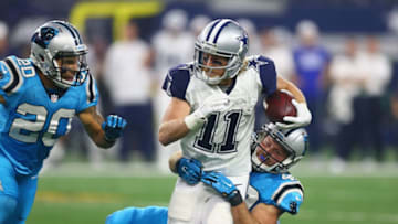 ARLINGTON, TX - NOVEMBER 26: Cole Beasley #11 of the Dallas Cowboys runs the ball against Colin Jones #42 of the Carolina Panthers in the first quarter on November 26, 2015 in Arlington, Texas. (Photo by Ronald Martinez/Getty Images)