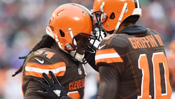 Dec 24, 2016; Cleveland, OH, USA; Cleveland Browns running back Isaiah Crowell (34) and quarterback Robert Griffin III (10) celebrate after Crowell