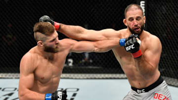 ABU DHABI, UNITED ARAB EMIRATES - JULY 12: (L-R) Jiri Prochazka of the Czech Republic punches Volkan Oezdemir of Switzerland in their light heavyweight fight during the UFC 251 event at Flash Forum on UFC Fight Island on July 12, 2020 on Yas Island, Abu Dhabi, United Arab Emirates. (Photo by Jeff Bottari/Zuffa LLC)