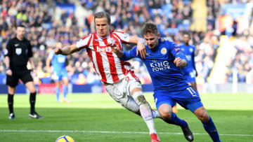LEICESTER, ENGLAND - FEBRUARY 24: Marc Albrighton of Leicester City is challenged by Moritz Bauer of Stoke City during the Premier League match between Leicester City and Stoke City at The King Power Stadium on February 24, 2018 in Leicester, England. (Photo by Michael Regan/Getty Images)