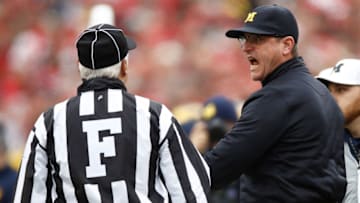 COLUMBUS, OH - NOVEMBER 26: Head coach Jim Harbaugh of the Michigan Wolverines argues a call on the sideline during the first half against the Ohio State Buckeyes at Ohio Stadium on November 26, 2016 in Columbus, Ohio. (Photo by Gregory Shamus/Getty Images)
