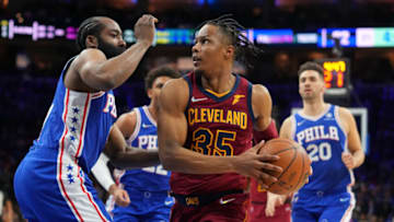 PHILADELPHIA, PA - MARCH 04: Isaac Okoro #35 of the Cleveland Cavaliers drives to the basket against James Harden #1 of the Philadelphia 76ers at the Wells Fargo Center on March 4, 2022 in Philadelphia, Pennsylvania. The 76ers defeated the Cavaliers 125-119. NOTE TO USER: User expressly acknowledges and agrees that, by downloading and or using this photograph, User is consenting to the terms and conditions of the Getty Images License Agreement. (Photo by Mitchell Leff/Getty Images)