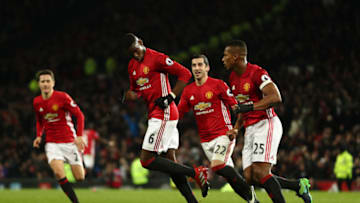 MANCHESTER, ENGLAND - DECEMBER 31: Paul Pogba of Manchester United celebrates with his team mates after scoring a goal to make it 2-1 during the Premier League match between Manchester United and Middlesbrough at Old Trafford on December 31, 2016 in Manchester, England. (Photo by James Baylis - AMA/Getty Images)