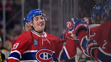 Apr 13, 2023; Montreal, Quebec, CAN; Montreal Canadiens forward Lucas Condotta (73) celebrates with teammates after scoring his first NHL goal during the first period of the game against the Boston Bruins at the Bell Centre. Mandatory Credit: Eric Bolte-USA TODAY Sports