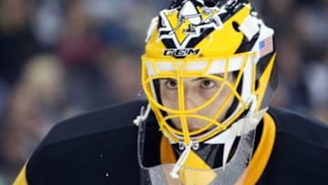 Jan 2, 2016; Pittsburgh, PA, USA; Pittsburgh Penguins goalie Marc-Andre Fleury (29) looks on against the New York Islanders during the third period at the CONSOL Energy Center. The Penguins won 5-2. Mandatory Credit: Charles LeClaire-USA TODAY Sports