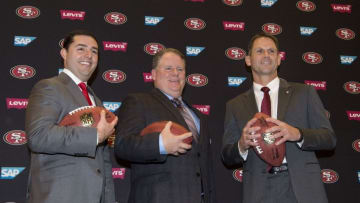 January 20, 2016; Santa Clara, CA, USA; San Francisco 49ers chief executive officer Jed York (left), Chip Kelly (center), and San Francisco 49ers general manager Trent Baalke (right) pose for a photo in a press conference after naming Kelly as the new head coach for the San Francisco 49ers at Levi