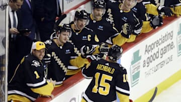 Nov 1, 2022; Pittsburgh, Pennsylvania, USA; The Pittsburgh Penguins bench congratulates right wing Josh Archibald (15) on his goal against the Boston Bruins during the second period at PPG Paints Arena. Mandatory Credit: Charles LeClaire-USA TODAY Sports