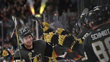 LAS VEGAS, NV - DECEMBER 19: Shea Theodore #27 of the Vegas Golden Knights celebrates with teammates after scoring on a power-play goal with 2.3 seconds left in the third period to beat the Tampa Bay Lightning 4-3 at T-Mobile Arena on December 19, 2017 in Las Vegas, Nevada. (Photo by Ethan Miller/Getty Images)