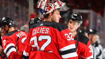 NEWARK, NJ - JANUARY 23: Jon Gillies #32 of the New Jersey Devils at the bench during the National Hockey League game between the New Jersey Devils and the Los Angeles Kings on January 23, 2022 at the Prudential Center in Newark, New Jersey. (Photo by Rich Graessle/Getty Images)