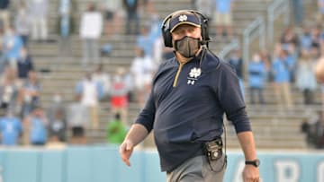 CHAPEL HILL, NORTH CAROLINA - NOVEMBER 27: Head coach Brian Kelly of the Notre Dame Fighting Irish looks on during the first half of the game against the North Carolina Tar Heels at Kenan Stadium on November 27, 2020 in Chapel Hill, North Carolina. (Photo by Grant Halverson/Getty Images)