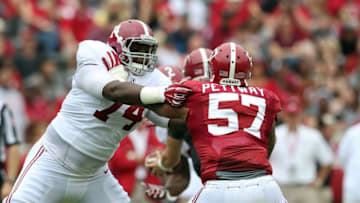 Apr 18, 2015; Tuscaloosa, AL, USA; Alabama Crimson Tide offensive lineman Cam Robinson (74) blocks Alabama Crimson Tide defensive lineman D.J. Pettway (57) during the annual A-day game at Bryant Denny Stadium. Mandatory Credit: Marvin Gentry-USA TODAY Sports