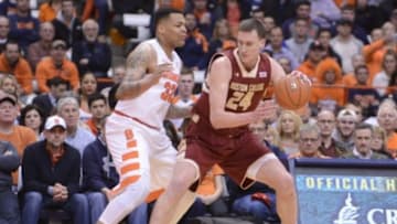 Jan 13, 2016; Syracuse, NY, USA; Boston College Eagles center Dennis Clifford (24) posts up against Syracuse Orange center DaJuan Coleman (32) during the first half at the Carrier Dome. Mandatory Credit: Mark Konezny-USA TODAY Sports