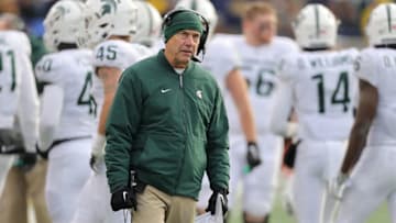 ANN ARBOR, MI - NOVEMBER 16: Michigan State Spartans head football coach Mark Dantonio watches the replay late in the fourth quarter of the game against the Michigan Wolverines at Michigan Stadium on November 16, 2019 in Ann Arbor, Michigan. Michigan defeated Michigan State 40-10. (Photo by Leon Halip/Getty Images)