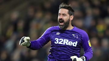 NORWICH, ENGLAND - DECEMBER 29: Scott Carson of Derby County celebrates a goal during the Sky Bet Championship match between Norwich City and Derby County at Carrow Road on December 29, 2018 in Norwich, England. (Photo by Stephen Pond/Getty Images)
