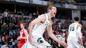 INDIANAPOLIS, IN - MARCH 11: Matt Costello #10 of the Michigan State Spartans reacts after a dunk against the Ohio State Buckeyes in the quarterfinal round of the Big Ten Basketball Tournament at Bankers Life Fieldhouse on March 11, 2016 in Indianapolis, Indiana. Michigan State defeated Ohio State 81-54. (Photo by Joe Robbins/Getty Images)