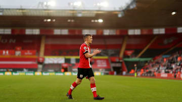 SOUTHAMPTON, ENGLAND - DECEMBER 19: James Ward-Prowse of Southampton applauds the fans as he walks to take a corner kick during the Premier League match between Southampton and Manchester City at St Mary's Stadium on December 19, 2020 in Southampton, England. A limited number of fans are welcomed back to stadiums to watch elite football across England. This was following easing of restrictions on spectators in tiers one and two areas only. (Photo by Naomi Baker/Getty Images)