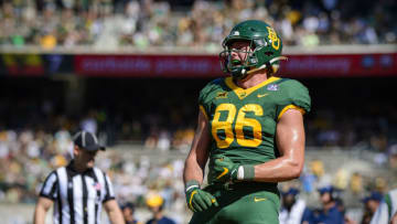 Oct 9, 2021; Waco, Texas, USA; Baylor Bears tight end Ben Sims (86) celebrates a touchdown against the West Virginia Mountaineers during the first half at McLane Stadium. Mandatory Credit: Jerome Miron-USA TODAY Sports