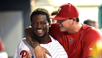 Jul 5, 2016; Philadelphia, PA, USA; Philadelphia Phillies center fielder Odubel Herrera (37) celebrates with starting pitcher Vince Velasquez (28) in the dugout against the Atlanta Braves at Citizens Bank Park. The Phillies defeated the Braves, 5-1. Mandatory Credit: Eric Hartline-USA TODAY Sports