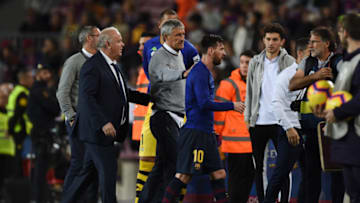 BARCELONA, SPAIN - NOVEMBER 11: Quique Setien manager of Real Betis pats Lionel Messi of Barcelona on the back after the La Liga match between FC Barcelona and Real Betis Balompie at Camp Nou on November 11, 2018 in Barcelona, Spain. (Photo by Alex Caparros/Getty Images)