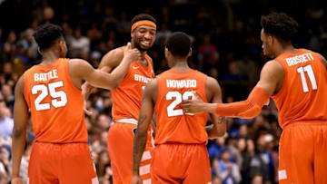 DURHAM, NORTH CAROLINA - JANUARY 14: (L-R) Tyus Battle #25, Paschal Chukwu #13, Frank Howard #23 and Oshae Brissett #11 of the Syracuse Orange celebrate during the final seconds of a win against the Syracuse Orange at Cameron Indoor Stadium on January 14, 2019 in Durham, North Carolina. Syracuse won 95-91 in overtime. (Photo by Grant Halverson/Getty Images)