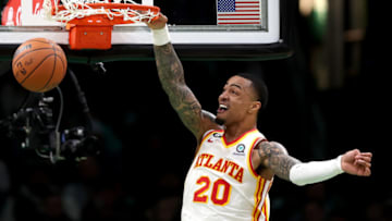 BOSTON, MASSACHUSETTS - APRIL 25: John Collins #20 of the Atlanta Hawks dunks the ball against the Boston Celtics during the third quarter in game five of the Eastern Conference First Round Playoffs at TD Garden on April 25, 2023 in Boston, Massachusetts. NOTE TO USER: User expressly acknowledges and agrees that, by downloading and or using this photograph, User is consenting to the terms and conditions of the Getty Images License Agreement. (Photo by Maddie Meyer/Getty Images)