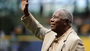 Aug 2, 2013; Milwaukee, WI, USA; Hall of Famer Hank Aaron waves to fans during a ceremony for former Milwaukee Brewer Robin Yount (not pictured) before game against the Washington Nationals at Miller Park. Mandatory Credit: Benny Sieu-USA TODAY Sports