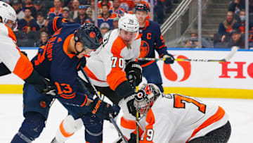 Oct 27, 2021; Edmonton, Alberta, CAN; Philadelphia Flyers goaltender Carter Hart (79) makes a save on Edmonton Oilers forward Jesse Puljujarvi (13) during the third period at Rogers Place. Mandatory Credit: Perry Nelson-USA TODAY Sports