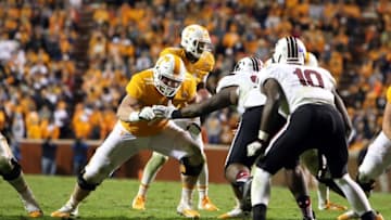 Nov 7, 2015; Knoxville, TN, USA; Tennessee Volunteers offensive lineman Dylan Wiesman (71) blocks for `Tennessee Volunteers quarterback Joshua Dobbs (11) against the South Carolina Gamecocks at Neyland Stadium. Mandatory Credit: Randy Sartin-USA TODAY Sports. Tennessee won 27 to 24.