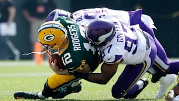 GREEN BAY, WI - SEPTEMBER 16: Aaron Rodgers #12 of the Green Bay Packers gets sacked during the first quarter of a game against the Minnesota Vikings at Lambeau Field on September 16, 2018 in Green Bay, Wisconsin. (Photo by Joe Robbins/Getty Images)