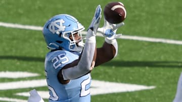 Dec 5, 2020; Chapel Hill, North Carolina, USA; North Carolina Tar Heels running back Javonte Williams (25) catches the ball in the first quarter at Kenan Memorial Stadium. Mandatory Credit: Bob Donnan-USA TODAY Sports