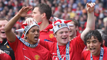 MANCHESTER, ENGLAND - MAY 16: Nani and Wayne Rooney of Manchester United celebrate after the Barclays Premier League match between Manchester United and Arsenal at Old Trafford on May 16 2009, in Manchester, England. (Photo by Matthew Peters/Manchester United via Getty Images)