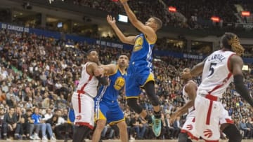 Oct 1, 2016; Vancouver, British Columbia, CAN; Golden State Warriors guard Stephen curry (30) lays up for two points against Toronto Raptors in the first quarter at Rogers Arena. Mandatory Credit: Peter Llewellyn-USA TODAY Sports