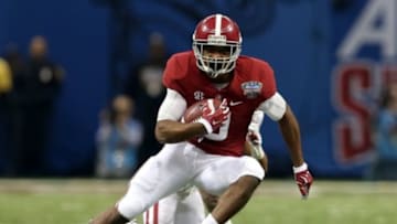 Jan 2, 2014; New Orleans, LA, USA; Alabama Crimson Tide wide receiver Amari Cooper (9) runs after a catch against the Oklahoma Sooners during the first quarter of the Sugar Bowl at the Mercedes-Benz Superdome. Mandatory Credit: Chuck Cook-USA TODAY Sports