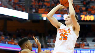 SYRACUSE, NEW YORK - NOVEMBER 06: Buddy Boeheim #35 of the Syracuse Orange shoots the ball over Tyler Kidd (L) of the Eastern Washington Eagles during the second half at the Carrier Dome on November 06, 2018 in Syracuse, New York. (Photo by Rich Barnes/Getty Images)