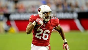 Dec. 16, 2012; Glendale, AZ, USA; Arizona Cardinals running back Beanie Wells (26) runs 31 yards for a touchdown during the second half against the Detroit Lions at University of Phoenix Stadium. The Cardinals beat the Lions 38-10. Mandatory Credit: Matt Kartozian-USA TODAY Sports