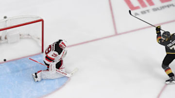 LAS VEGAS, NEVADA - MARCH 03: William Karlsson #71 of the Vegas Golden Knights scores a third-period goal, his 100th career NHL goal, against Mackenzie Blackwood #29 of the New Jersey Devils during their game at T-Mobile Arena on March 3, 2020 in Las Vegas, Nevada. The Golden Knights defeated the Devils 3-0. (Photo by Ethan Miller/Getty Images)