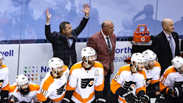 TORONTO, ONTARIO - AUGUST 29: Head coach Alain Vigneault of the Philadelphia Flyers reacts against the New York Islanders during the third period in Game Three of the Eastern Conference Second Round during the 2020 NHL Stanley Cup Playoffs at Scotiabank Arena on August 29, 2020 in Toronto, Ontario. (Photo by Elsa/Getty Images)
