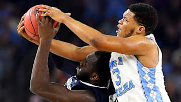 Apr 4, 2016; Houston, TX, USA; North Carolina Tar Heels forward Kennedy Meeks (3) and Villanova Wildcats forward Daniel Ochefu (23) go for a rebound during the second half in the championship game of the 2016 NCAA Men