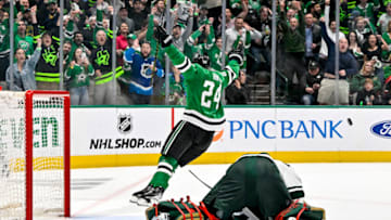 Apr 19, 2023; Dallas, Texas, USA; Dallas Stars center Roope Hintz (24) celebrates after scoring his second goal against Minnesota Wild goaltender Marc-Andre Fleury (29) during the second period in game two of the first round of the 2023 Stanley Cup Playoffs at American Airlines Center. Mandatory Credit: Jerome Miron-USA TODAY Sports